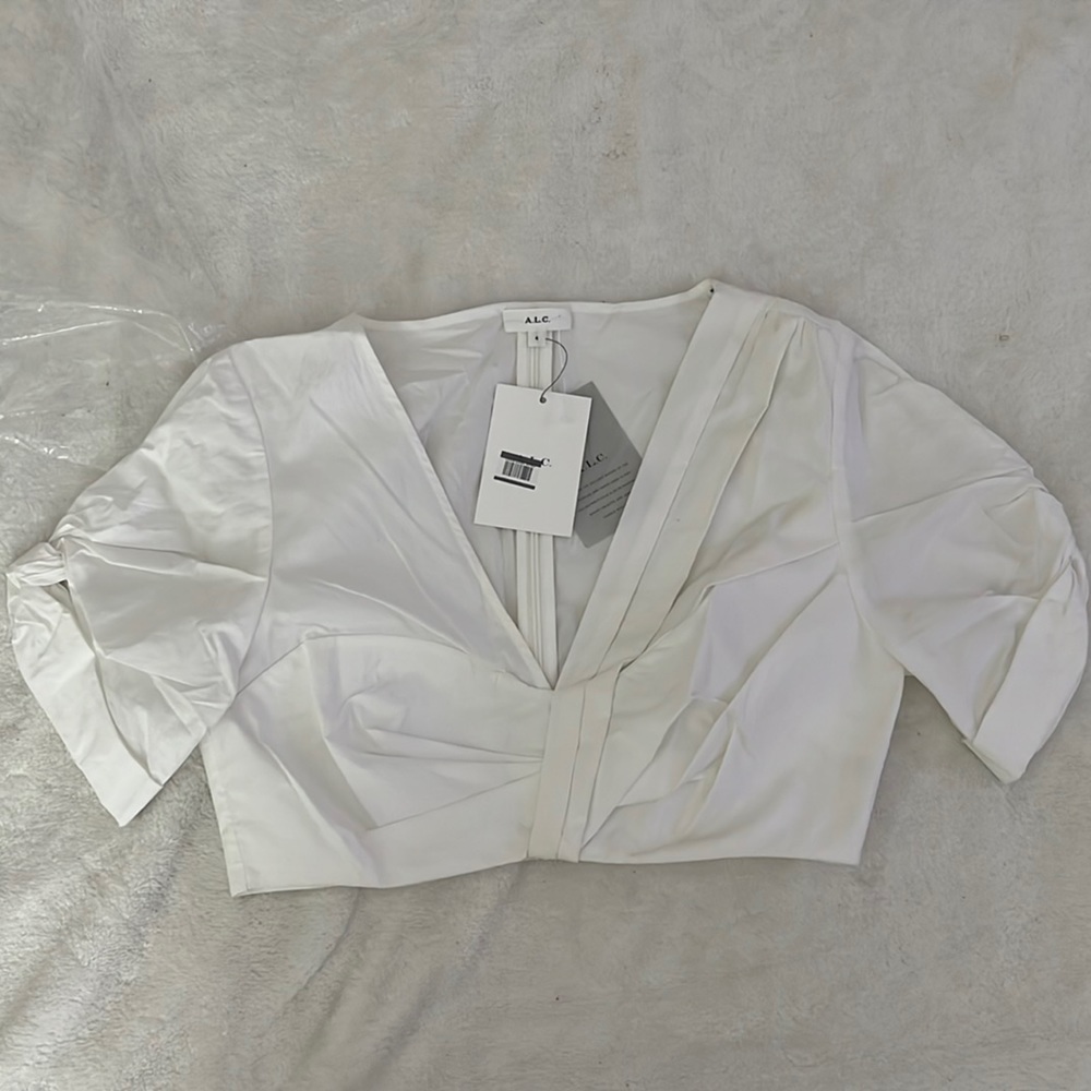 A fabulous white crop top - Can be paired with Jeans or skirt or shorts …